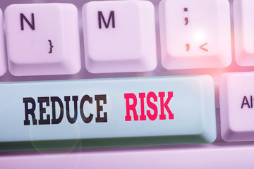 Word writing text Reduce Risk. Business photo showcasing lessen the potential damage that could be caused by a hazard