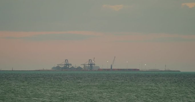 Commercial Docks in the Sea at Sunset, Progreso, Mexico
