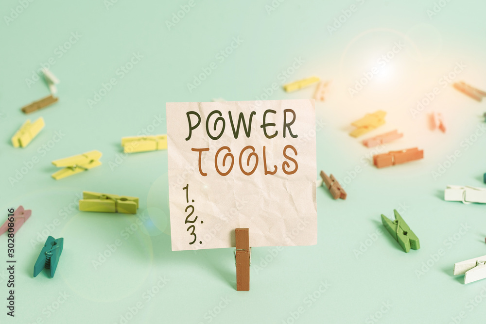 Poster handwriting text power tools. conceptual photo tool that is actuated by additional power source and 