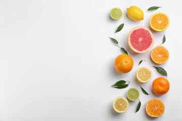 Foto op Plexiglas Flat lay composition with tangerines and different citrus fruits on white background. Space for text © New Africa