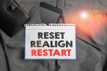 Writing note showing Reset Realign Restart. Business concept for Life audit will help you put...