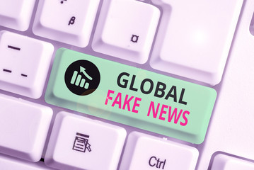 Writing note showing Global Fake News. Business concept for False information Journalism Lies...