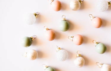 Pastel Christmas ornaments background.