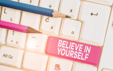 Text sign showing Believe In Yourself. Business photo text Encouraging someone Selfconfidence Motivation quote White pc keyboard with empty note paper above white background key copy space