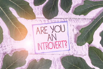 Handwriting text Are You An Introvertquestion. Conceptual photo demonstrating who tends to turn...
