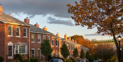 old brick townhouses roofs at sunset, boston massachusetts - obrazy, fototapety, plakaty