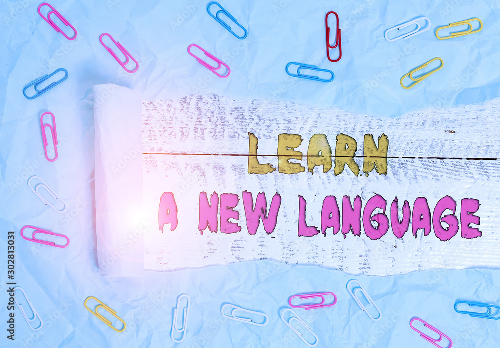 Poster writing note showing learn a new language. business concept for study words other than the native mo