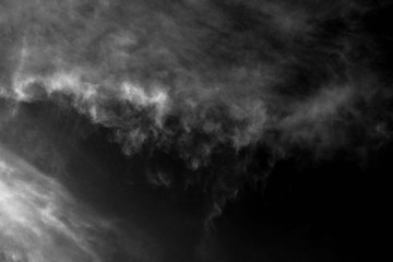 white cloud and black sky textured background