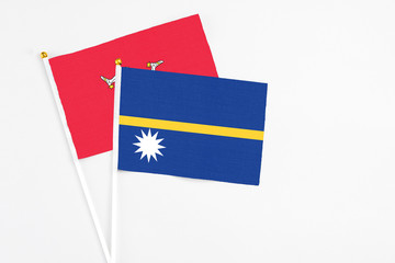 Nauru and Isle Of Man stick flags on white background. High quality fabric, miniature national...