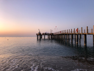 Fototapeta premium pier mooring sea dawn waves