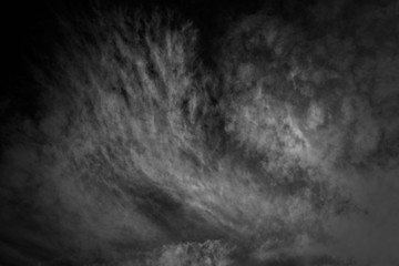 white cloud and black sky textured background