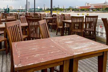 outdoor dining table set with Chao Phraya River side
