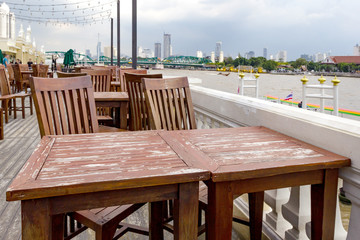 outdoor dining table set with Chao Phraya River side
