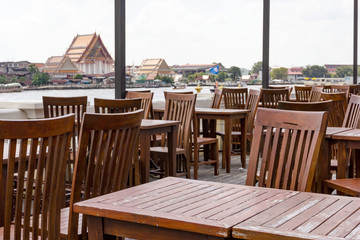 outdoor dining table set with Chao Phraya River side