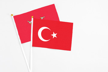 Turkey and Isle Of Man stick flags on white background. High quality fabric, miniature national...