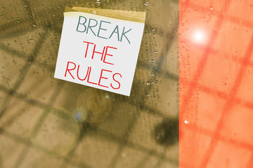 Writing note showing Break The Rules. Business concept for Make changes do everything different...