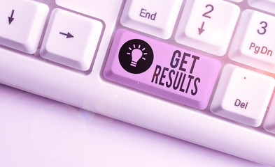 Text sign showing Get Results. Business photo showcasing to proceed or arise as a consequence effect or conclusion White pc keyboard with empty note paper above white background key copy space