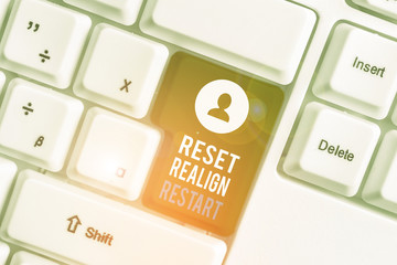 Writing note showing Reset Realign Restart. Business concept for Life audit will help you put...