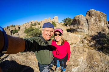 Middle age outdoor couple selfie