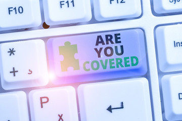 Writing note showing Are You Covered. Business concept for Asking about how medications are covered...