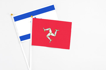 Isle Of Man and Israel stick flags on white background. High quality fabric, miniature national...