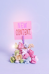 Text sign showing New Content. Business photo showcasing fresh valuable and relevant information or...