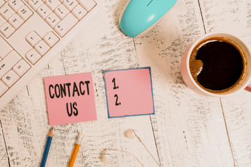 Word writing text Contact Us. Business photo showcasing Term used to describe reaching out with the...