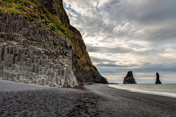 Reynisfjara black sand beach with its Basalt columns on the south coast of Iceland near the village...