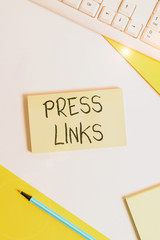Text sign showing Press Links. Business photo showcasing intended to analysisipulate a site s is ranking in Google search Flat lay above table with pc keyboard and copy space paper for text messages