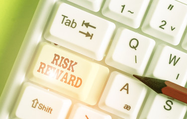 Writing note showing Risk Reward. Business concept for assess the profit potential of a trade...