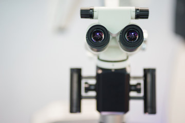 Fototapeta premium Professional dental endodontic binocular microscope.