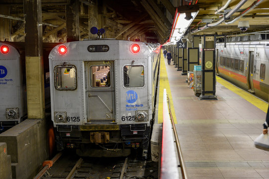 New York, New York, USA - November 7, 2019: Metro-North train on a platform in Grand Central Terminal.