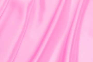 Plastic pink satin fabric texture soft blur background