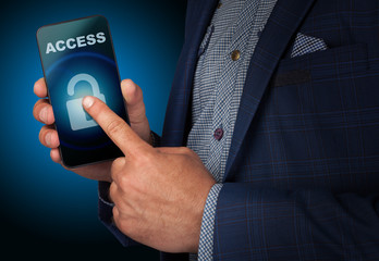 Business, Technology, Internet and network concept. Young businessman working on a virtual screen of the future and sees the inscription: Access