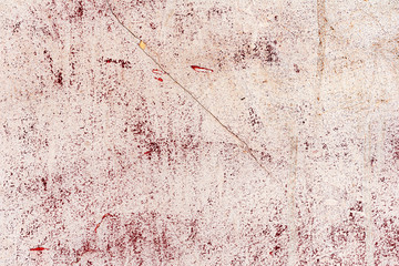 Texture of a concrete wall with cracks and scratches which can be used as a background