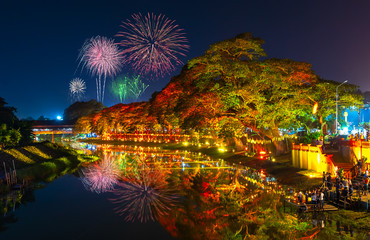 LAMPHUN, THAILAND - NOVEMBER 10, 2019 : Symphony of Lights is the spectacular light and sound show at City Wall beside the river near Wat Phra That Hariphunchai Temple for celebration in Loy Krathong 