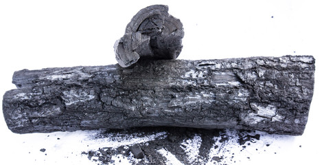 black coal on a white background. a porous black solid consisting of an amorphous form of carbon,...