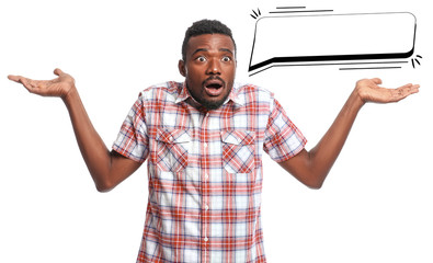 Portrait of shocked African-American man on white background