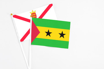 Sao Tome And Principe and Jersey stick flags on white background. High quality fabric, miniature...