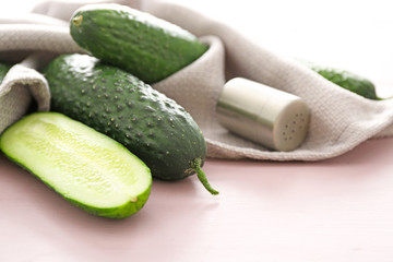 Fresh green cucumbers on table