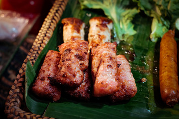 Northeastern Grilled Sausage served on a Banana Leaf