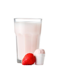 Glass of strawberry protein shake on white background