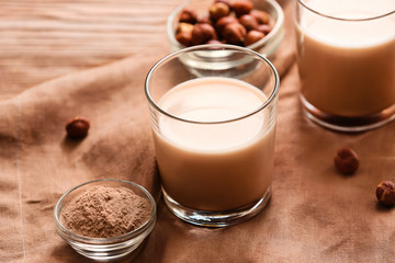 Glass of protein shake on table