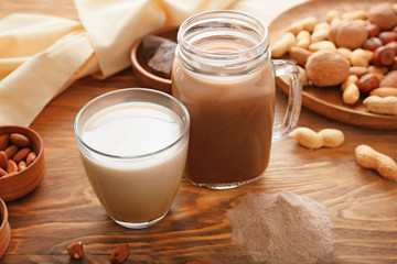 Tasty protein cocktail on wooden table