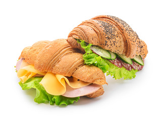 Tasty croissant sandwiches on white background