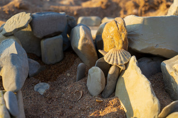 Children's stone fortress on the beach.