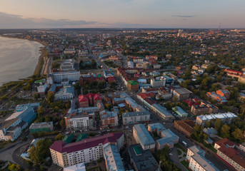 Aerial view of Tomsk city and Tom river, Lenin Avenue, Russia. Summer, evening, sunset