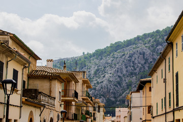 Street View in the City of Pollenca with Mountains in Background, Mallorca, Spain, 2018