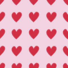 Seamless pattern with hearts on a pink background.