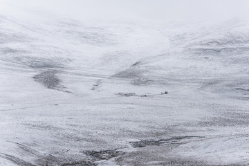 telegraph pole,  electric wire and mountain which covered with snow